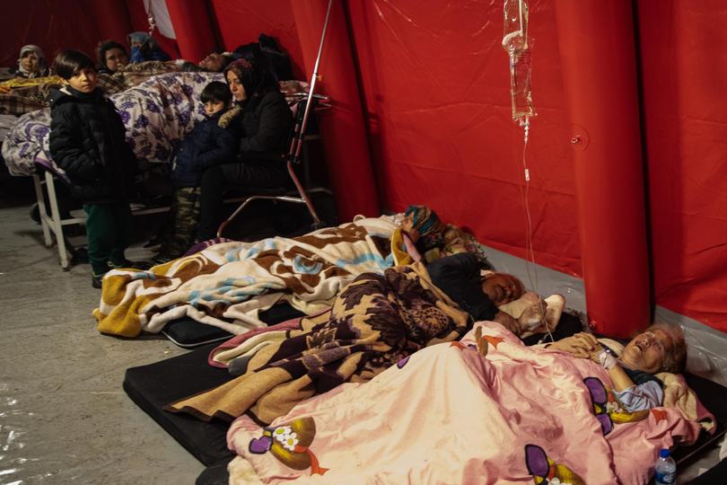 ISKENDERUN, TURKEY - FEBRUARY 06: Wounded earthquake survivors wait to be treated at a field hospital on February 06, 2023 in Iskenderun Turkey. A 7.8-magnitude earthquake hit near Gaziantep, Turkey, in the early hours of Monday, followed by another 7.5-magnitude tremor just after midday. The quakes caused widespread destruction in southern Turkey and northern Syria and were felt in nearby countries. (Photo by Burak Kara/Getty Images) Burak Kara