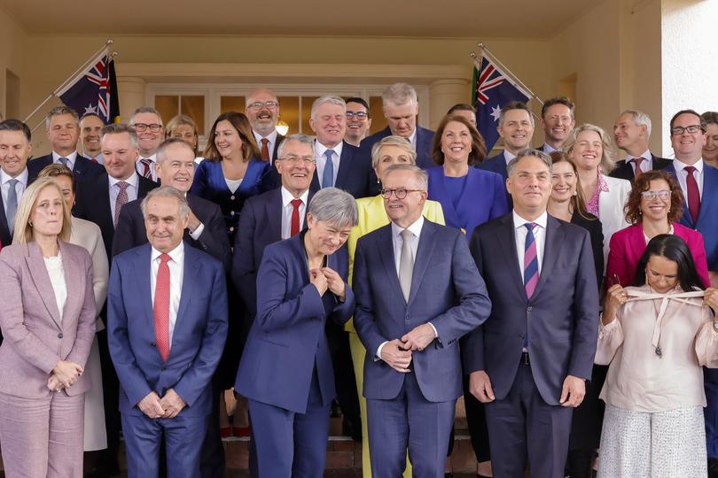 CANBERRA, AUSTRALIA - JUNE 01: Prime Minister Anthony Albanese prepares for a group photo with his new Ministry after a swearing-in ceremony at Government House on June 01, 2022 in Canberra, Australia. Prime Minister Anthony Albanese unveiled his new cabinet on Tuesday following the Labor party's victory in the Australian Federal election on 21 May 2022. (Photo by Jenny Evans/Getty Images)