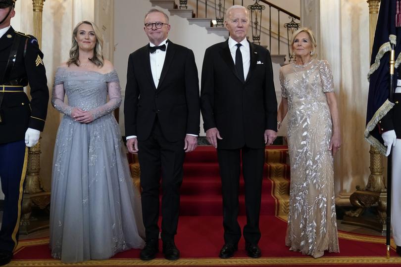 President Joe Biden, first lady Jill Biden, Australian Prime Minister Anthony Albanese and his partner Jodie Haydon pose for a photo at the Grand Staircase of the White House during the State Dinner Wednesday, Oct. 25, 2023, in Washington. (AP Photo/Evan Vucci)