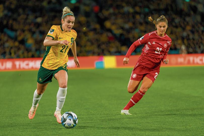 SYDNEY, AUSTRALIA - AUGUST 07: Ellie Carpenter (L) of Australia and Mille Gejl (R) of Denmark battle for the ball during the FIFA Women's World Cup Australia & New Zealand 2023 Round of 16 match between Australia and Denmark at Stadium Australia on August 07, 2023 in Sydney, Australia. (Photo by Andy Cheung/Getty Images) Andy Cheung