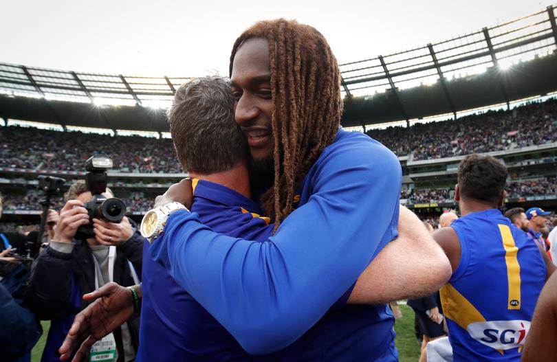 MELBOURNE, AUSTRALIA - SEPTEMBER 29: Adam Simpson, Senior Coach of the Eagles celebrates with injured star Nic Naitanui of the Eagles during the 2018 Toyota AFL Grand Final match between the West Coast Eagles and the Collingwood Magpies at the Melbourne Cricket Ground on September 29, 2018 in Melbourne, Australia. (Photo by Adam Trafford/AFL Media)