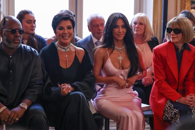 Corey Gamble, from left, Kris Jenner, Kim Kardashian and Anna Wintour attend the Victoria Beckham Spring/Summer 2024 womenswear fashion collection presented Friday, Sept. 29, 2023 in Paris. (AP Photo/Vianney Le Caer) Vianney Le Caer