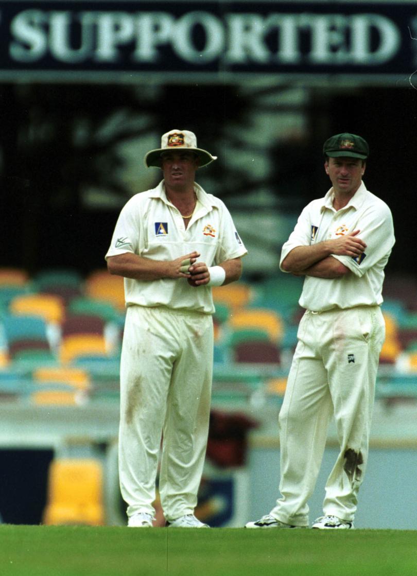 (Clockwise from above) Shane Warne and former Australian captain Steve Waugh, with whom he had an at-times frosty relationship, the spinner makes his way home after being banned for taking a diuretic, the newspaper headlines that followed him after the indicent and puffing on a cigarette, one of his well-publicised vices.