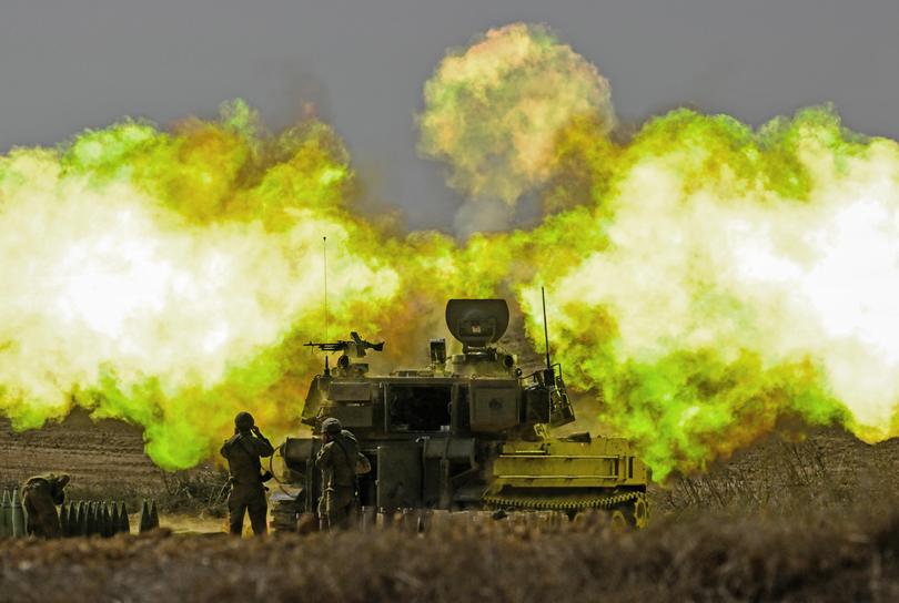 An IDF artillery unit fires towards Gaza on October 11, 2023 near Netivot, Israel. 