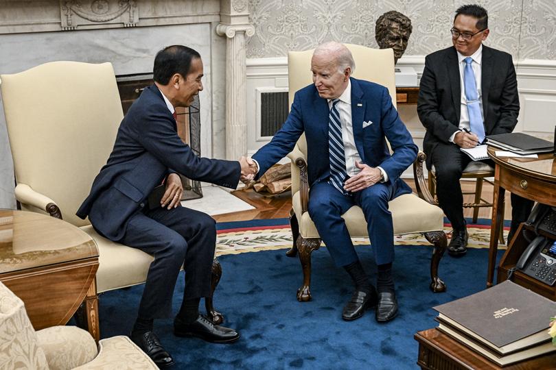 President Joe Biden meets with President Joko Widodo of Indonesia in the Oval Office of the White House in Washington, Nov. 13, 2023. President Biden and President Joko Widodo of Indonesia will announce on Monday a new strategic partnership, though their differences over the war in Gaza are likely to shape the Indonesian leader’s visit to Washington. (Kenny Holston/The New York Times)