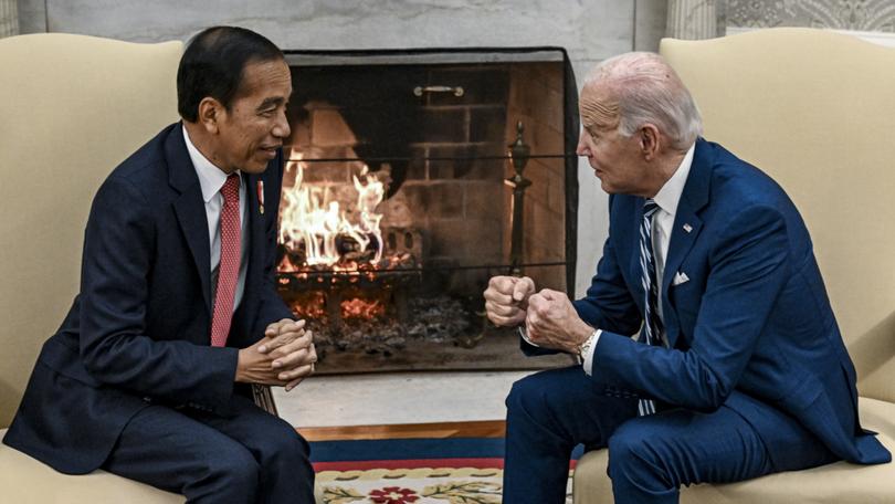 President Joe Biden meets with President Joko Widodo of Indonesia in the Oval Office of the White House in Washington, Nov. 13, 2023. 