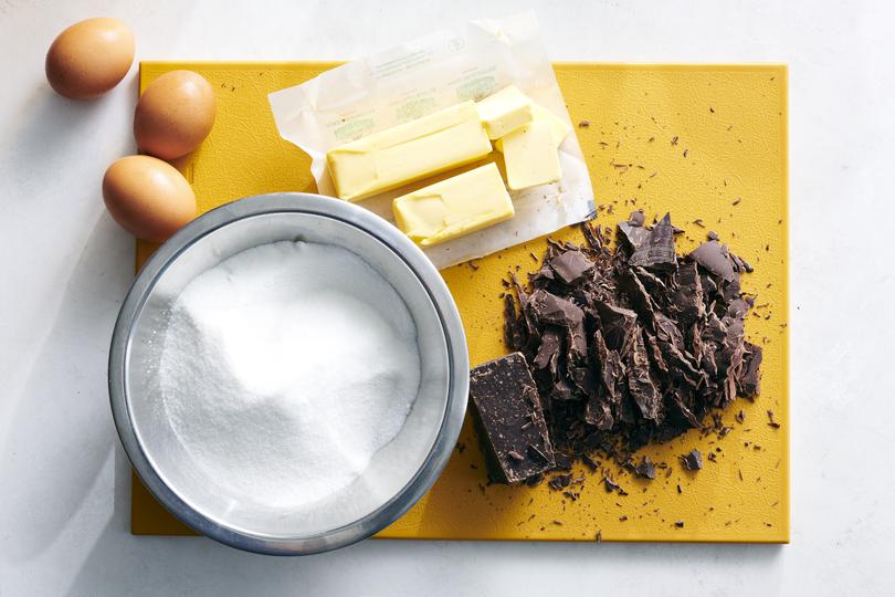 Ingredients for Melissa Clark’s Easy Skillet Brownies. Mixed and baked in one skillet, you don’t have time for second thoughts. And leaving the brownie in that skillet for serving, instead of cooling and cutting it into neat bars, is an invitation to dig right in. Food Stylist: Simon Andrews (David Malosh/The New York Times)
