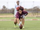 Honesty Butler snaps the ball during flag football practice at Fort Scott Community College.
