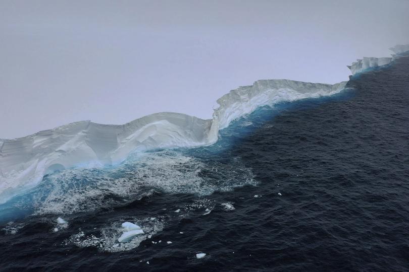 In this handout photo provided by the British Antarctic Survey, a view of the A23a iceberg is seen from the RRS Sir David Attenborough, Antarctica, Friday, Dec. 1, 2023. Britain's polar research ship has crossed paths with the largest iceberg in the world in a lucky encounter that enabled scientists to collect seawater samples around the colossal berg as it drifts out of Antarctic waters. The British Antarctic Survey said Monday, Dec. 4 that the RRS Sir David Attenborough passed the mega iceberg, known as the A23a, on Friday near the tip of the Antarctic Peninsula. (T. Gossman, M. Gascoyne, C. Grey/British Antarctic Survey via AP)