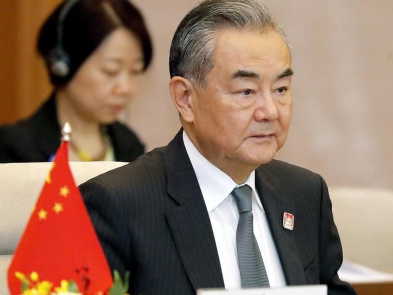 China's Foreign Minister Wang Yi says Beijing is willing to deepen co-operation with North Korea. (AP PHOTO)