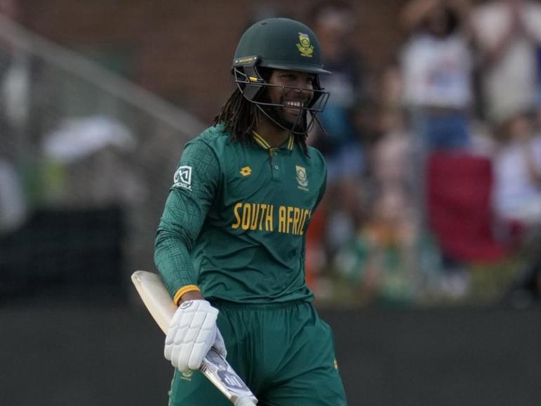 South Africa's Tony de Zorzi is all smiles after reaching 50 against India. (AP PHOTO)