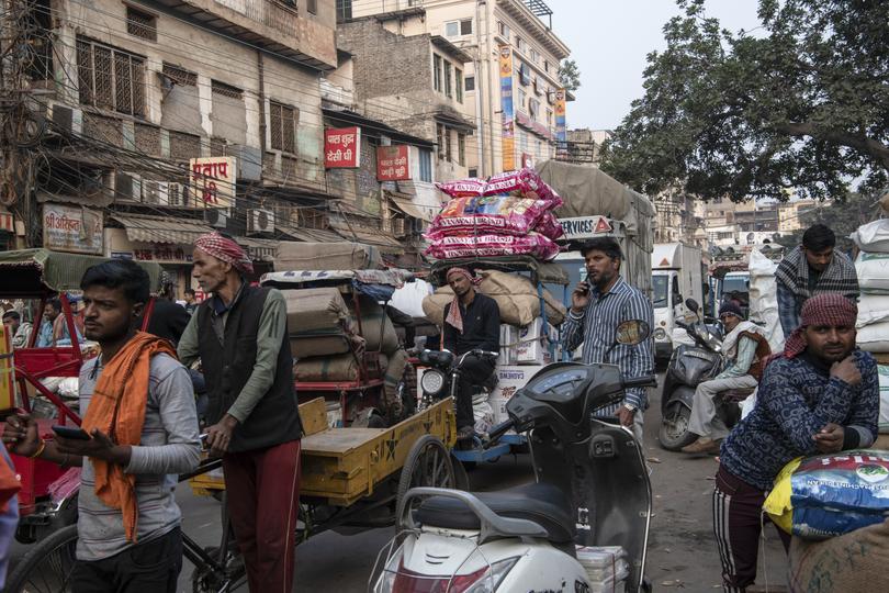 Workers at a wholesale market in New Delhi.