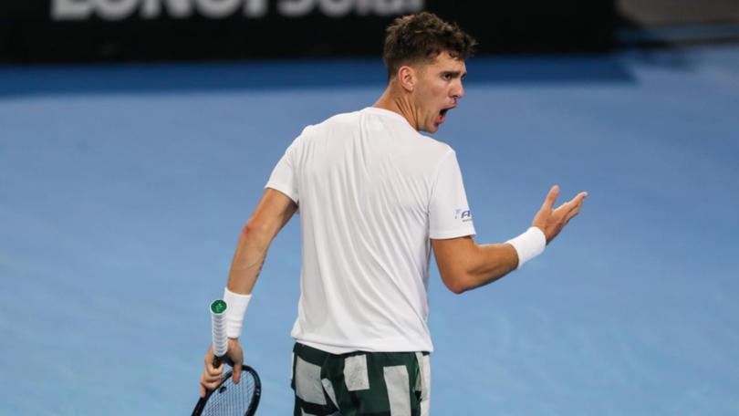 Thanasi Kokkinakis was unhappy about the balls used in his defeat to Dusan Lajovic in Adelaide. (Matt Turner/AAP PHOTOS)