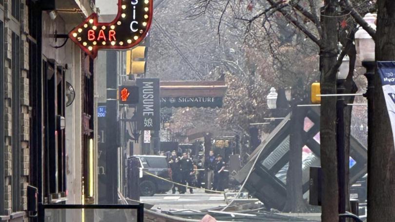 Investigators are determining the cause of a blast at the Sandman Signature hotel in Fort Worth. (AP PHOTO)