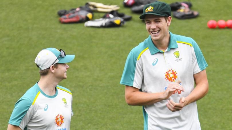 Marnus Labuschagne says Steve Smith (left) as opener and Cameron Green (right) at No.4 can work. (Dave Hunt/AAP PHOTOS)