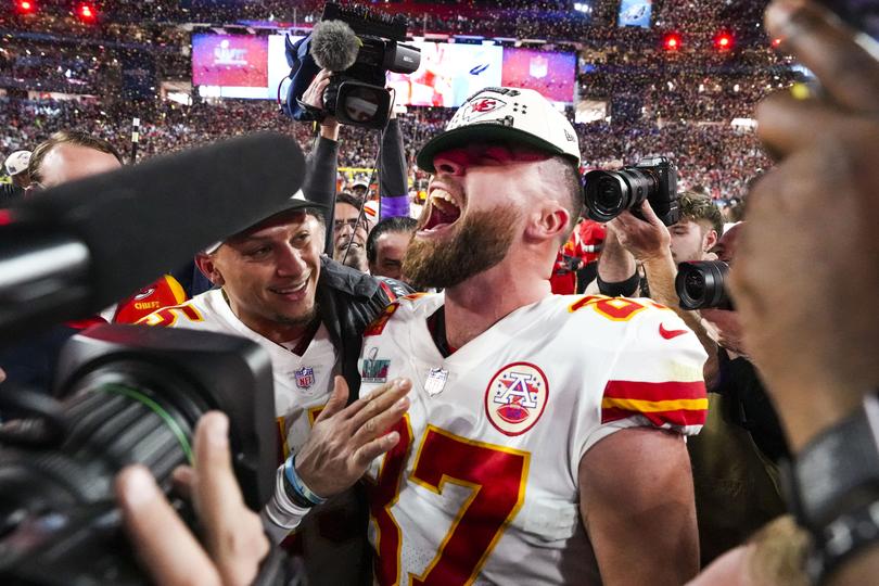 Travis Kelce, center, celebrates with Patrick Mahomes after the Kansas City Chiefs won the Super Bowl in Glendale, Ariz., Feb. 12, 2023. 