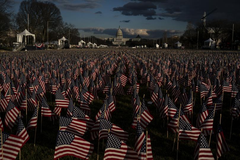 A field of flags on the National Mall representing the thousands of Americans who would normally attend the Inauguration ceremony, leading up to Joe Biden’s inauguration in Washington.