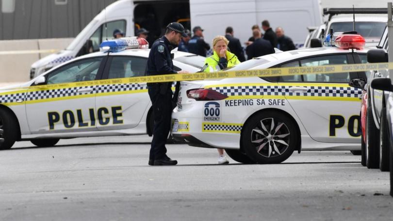 Police were called to a property in Adelaide's north after reports of multiple gunshots overnight. (David Mariuz/AAP PHOTOS)