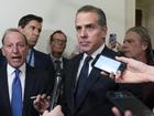 Hunter Biden, President Joe Biden's son, accompanied by his attorney Abbe Lowell, left, talks to reporters as they leave a House Oversight Committee hearing as Republicans are taking the first step toward holding him in contempt of Congress, Wednesday, Jan. 10, 2024, on Capitol Hill in Washington.  (AP Photo/Jose Luis Magana)