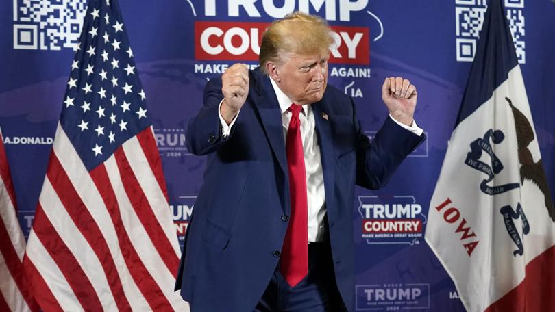 Former President Donald Trump dances after speaking at a campaign rally at Terrace View Event Center in Sioux Center, Iowa, Friday, Jan. 5, 2024. (AP Photo/Andrew Harnik)