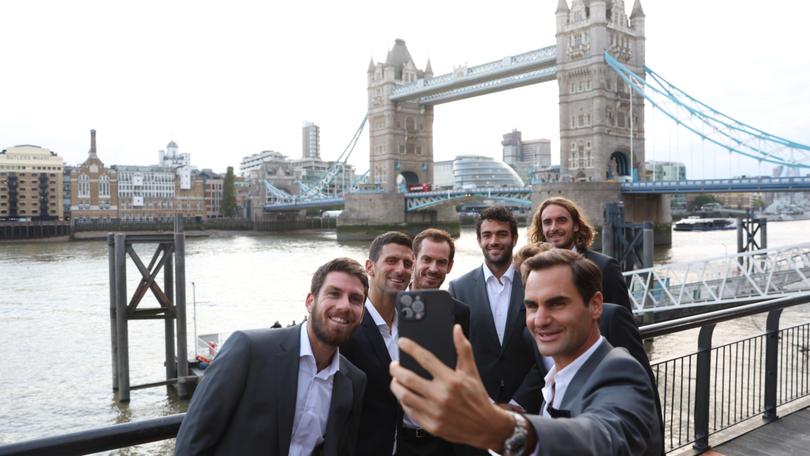 Cam Norrie, Novak Djokovic, Andy Murray, Matteo Berrettini, Stefanos Tsitsipas and Roger Federer take a selfie in front of Tower Bridge in 2022.
