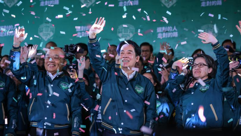 Taiwan's Vice President and presidential-elect from the Democratic Progressive Party (DPP) Lai Ching-te (C) and his running mate Hsiao Bi-khim (Centre R).