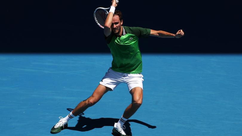 Daniil Medvedev plays a forehand in his round one match against Terence Atmane of France.