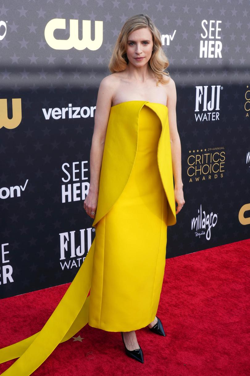 In what could be the brightest gown on the carpet, Brit Marling wore a yellow dress and paired it with black heels. 