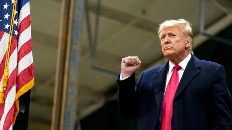 Former US President Donald Trump during the 2024 Iowa Republican caucuses at Horizon Events Centre in West Des Moines, Iowa, US, on Monday, Jan. 15, 2024.