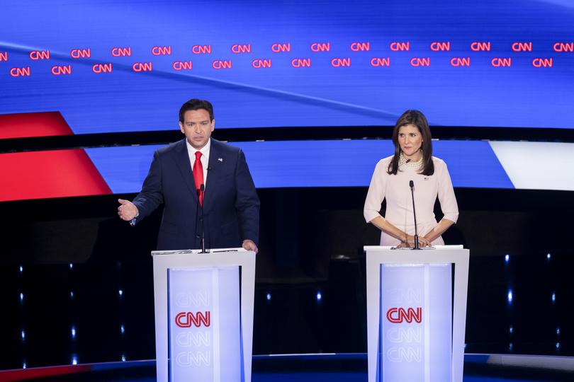 Nikki Haley, the former governor of South Carolina, listens as Florida Gov. Ron DeSantis speaks during the fifth Republican presidential debate.