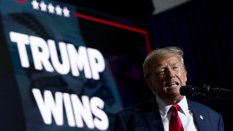 Republican presidential candidate former President Donald Trump speaks at a caucus night party in Des Moines, Iowa, Monday, Jan. 15, 2024. 