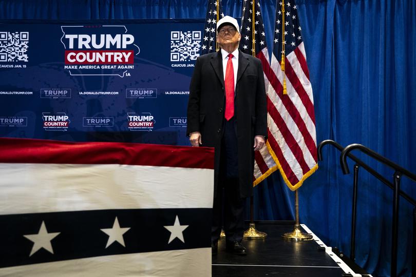 Former President Donald Trump takes the stage at a campaign rally in Indianola, Iowa, on Sunday, Jan. 14, 2024, the day before the Iowa caucuses. (Haiyun Jiang/The New York Times)