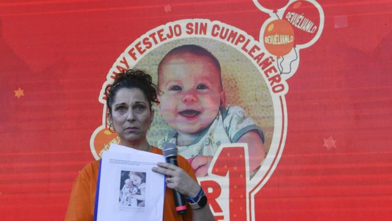 Relatives of infant Kfir Bibas, who was taken hostage by Hamas, have marked his first birthday. (AP PHOTO)