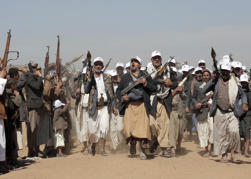 Houthi fighters march during a rally of support for the Palestinians in the Gaza Strip and against the U.S. strikes on Yemen outside Sanaa on Monday, Jan. 22, 2024. (AP Photo)