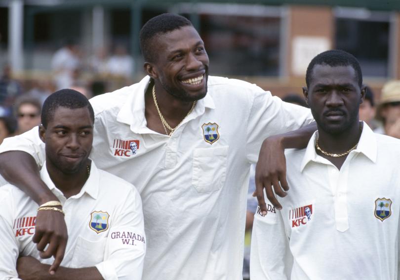 Curtly Ambrose (centre) stands with teammates Sherwin Campbell (left) and Courtney Browne.