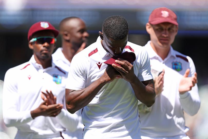 Shamar Joseph of the West Indies walks from the field after taking 5 wickets.