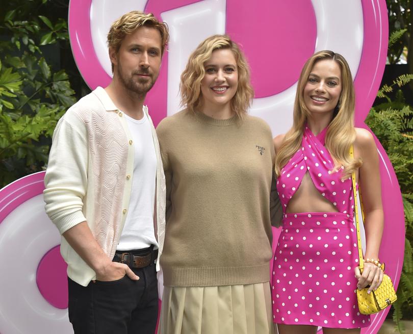 Ryan Gosling, from left, Greta Gerwig and Margot Robbie arrive at a photo call for "Barbie," Sunday, June 25, 2023, at the Four Seasons Hotel in Los Angeles. (Photo by Jordan Strauss/Invision/AP)