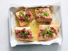 Rhubarb roasted salmon in New York, May 23, 2023. Paired with red rhubarb, these brilliantly pink fillets from Melissa Clark are on the table in 25 minutes. Food styled by Simon Andrews. (David Malosh/The New York Times)