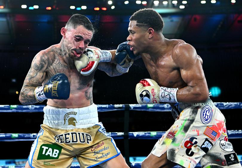 MELBOURNE, AUSTRALIA - JUNE 05: Devin Haney of the United States lands a punch to George Kambosos Jr of Australia during the World Lightweight Championship bout between George Kambosos Jr. of Australia and Devin Haney of the United States at Marvel Stadium on June 05, 2022 in Melbourne, Australia. (Photo by Quinn Rooney/Getty Images)