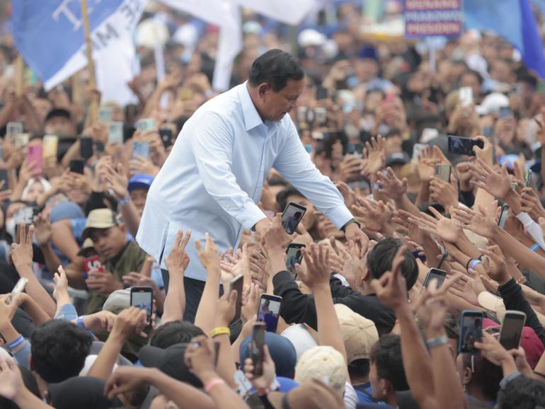 Indonesian presidential candidate Prabowo Subianto greets supporters during his campaign rally in East Java.