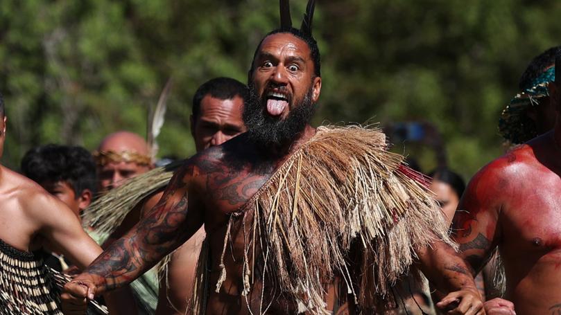 Maori warriors prepare to welcome the New Zealand government representatives in Waitangi.