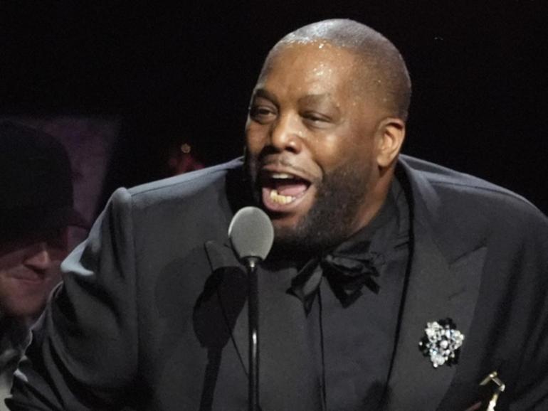 Rapper Killer Mike accepts the award for best rap album during the 66th annual Grammy Awards. (AP PHOTO)