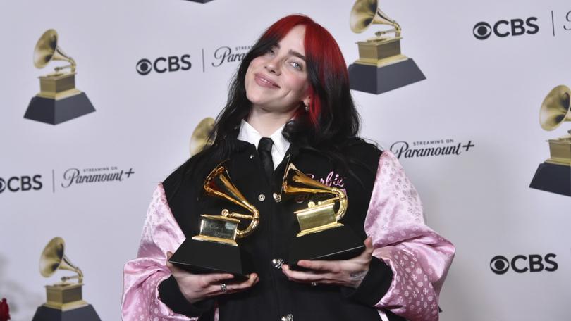 Billie Eilish poses in the press room.