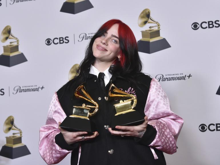 Billie Eilish poses in the press room.