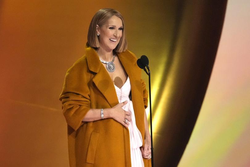 Celine Dion presents the award for album of the year during the 66th annual Grammy Awards on Sunday, Feb. 4, 2024, in Los Angeles. (AP Photo/Chris Pizzello)