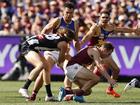 MELBOURNE, AUSTRALIA - SEPTEMBER 30: Nathan Murphy of the Magpies collides with Lincoln McCarthy of the Lions during the 2023 AFL Grand Final match between Collingwood Magpies and Brisbane Lions at Melbourne Cricket Ground, on September 30, 2023, in Melbourne, Australia. (Photo by Darrian Traynor/AFL Photos/via Getty Images)