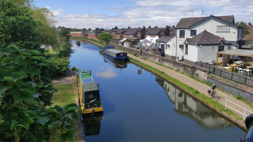 Pedalling by the Bridgewater Canal outside Manchester.