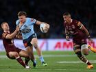 SYDNEY, AUSTRALIA - JUNE 08: Jack Wighton of the Blues is tackled by Daly Cherry-Evans of the Maroons during game one of the 2022 State of Origin series between the New South Wales Blues and the Queensland Maroons at Accor Stadium on June 08, 2022 in Sydney, Australia. (Photo by Cameron Spencer/Getty Images)