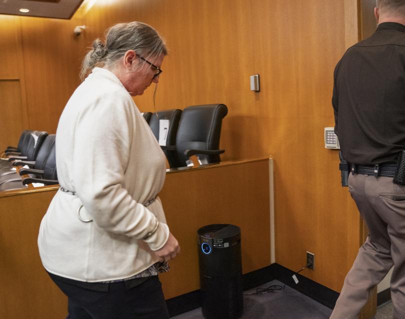 Jennifer Crumbley leaves the Oakland County courtroom after being found guilty on four counts involuntary manslaughter in the Oakland County courtroom of Cheryl Matthews on Tuesday, Feb. 6, 2024 in Pontiac, Mich.  Prosecutors say Crumbley was grossly negligent when she failed to tell Oxford High School that the family had guns, including a 9 mm handgun that her son, Ethan Crumbley, used at a shooting range on the weekend before the Nov. 30, 2021, attack.  (Mandi Wright/Detroit Free Press via AP, Pool)