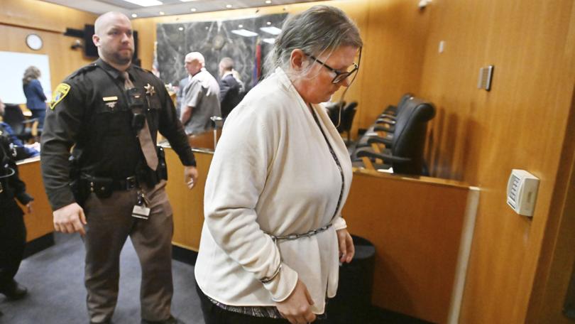 Defendant Jennifer Crumbley exits the courtroom after the jury's unanimous verdict of guilty of involuntary manslaughter on all counts.